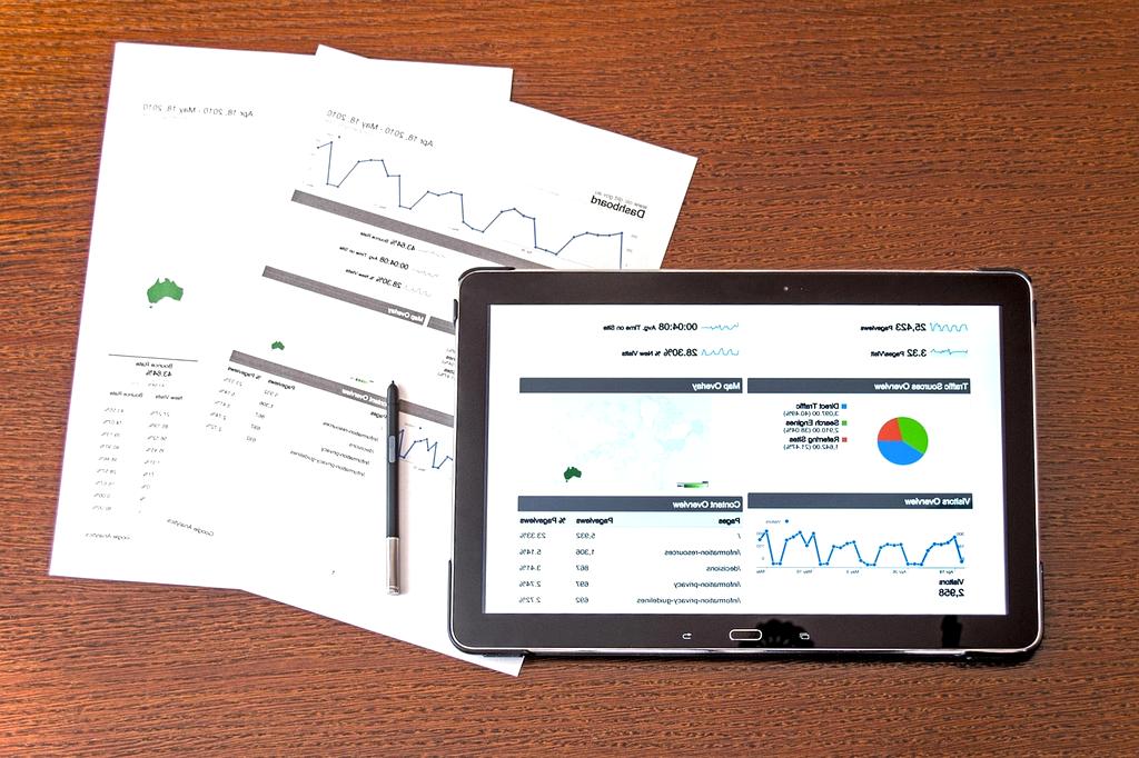Team analyzing marketing data on a screen